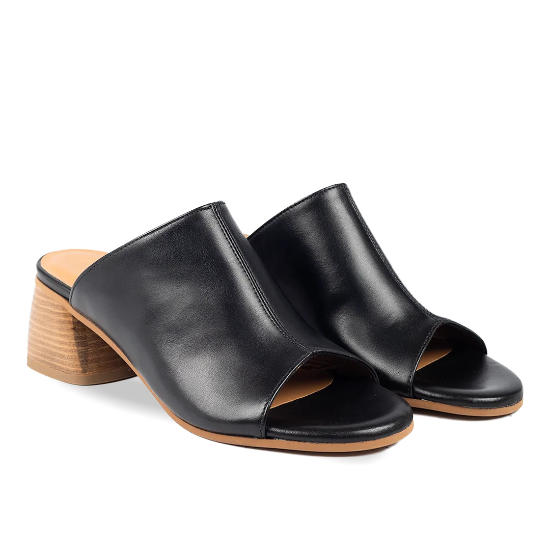 Mule with sculptural wooden heel