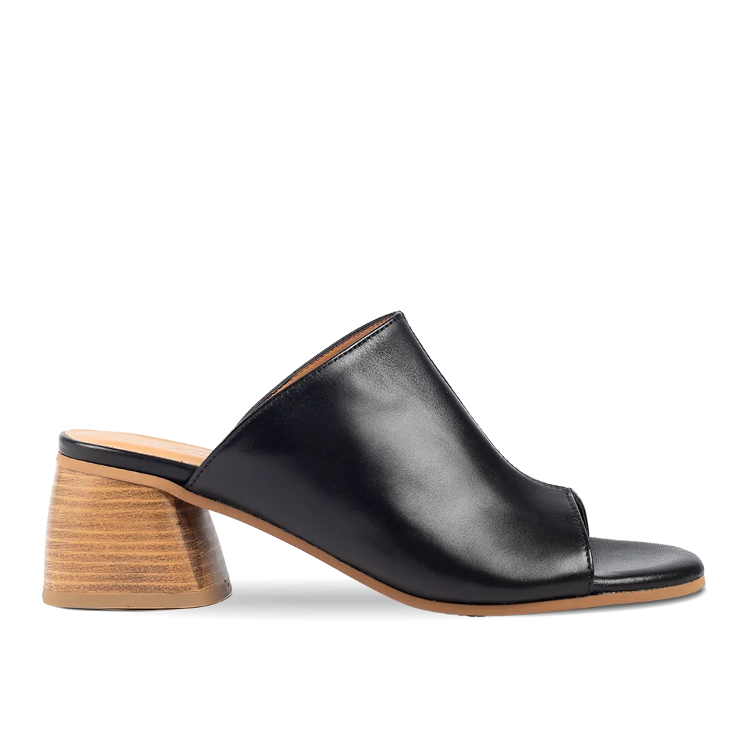 Mule with sculptural wooden heel