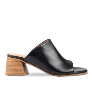 Mule with sculptural wooden heel